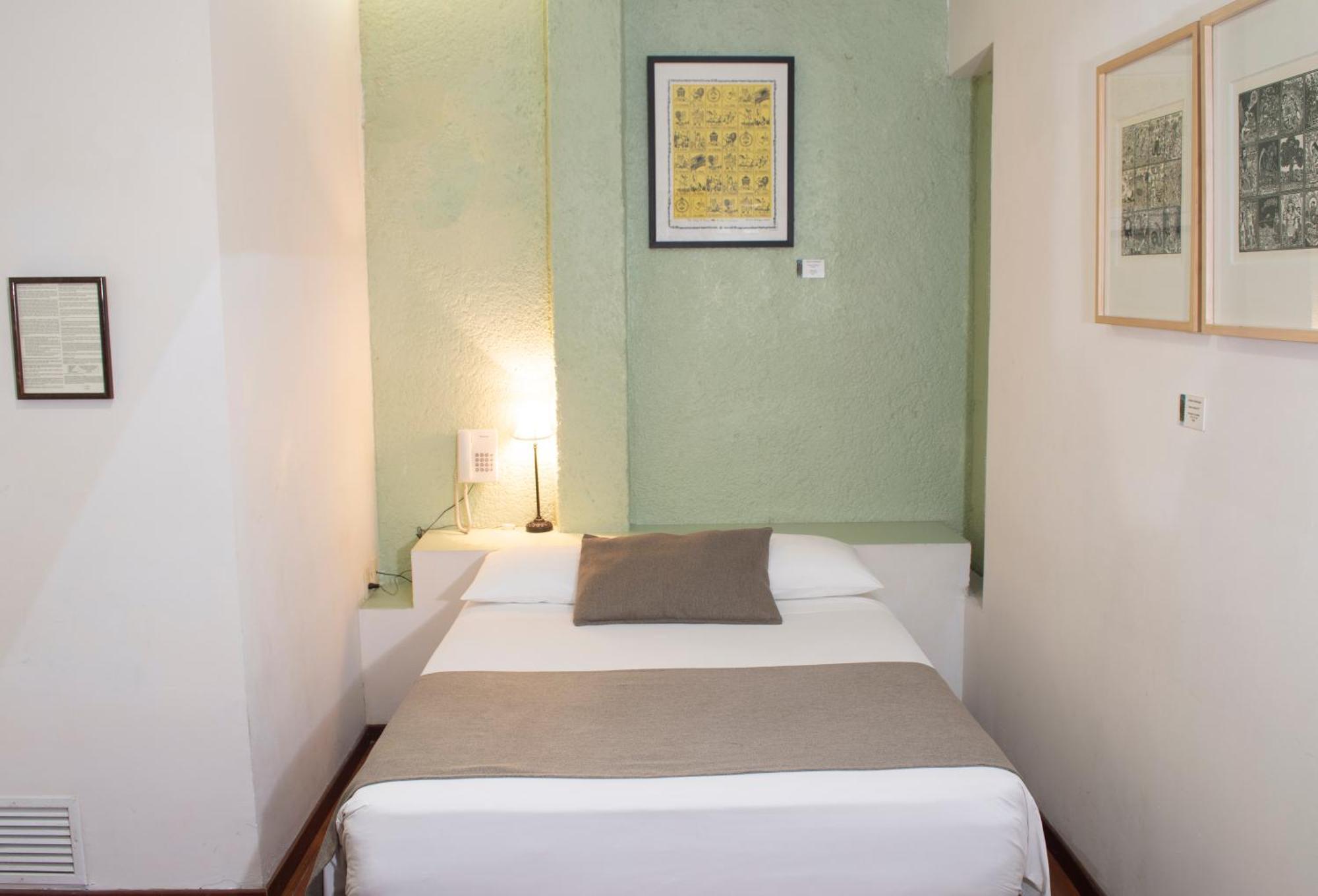 Portico Hotel & Galeria موروليا الغرفة الصورة