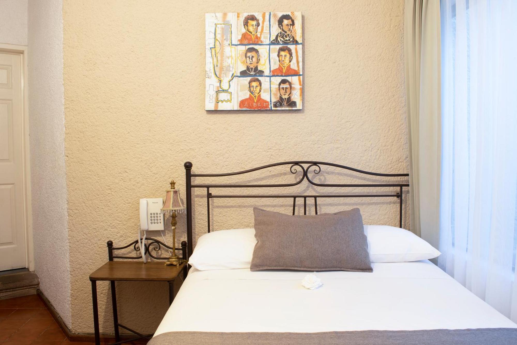 Portico Hotel & Galeria موروليا الغرفة الصورة