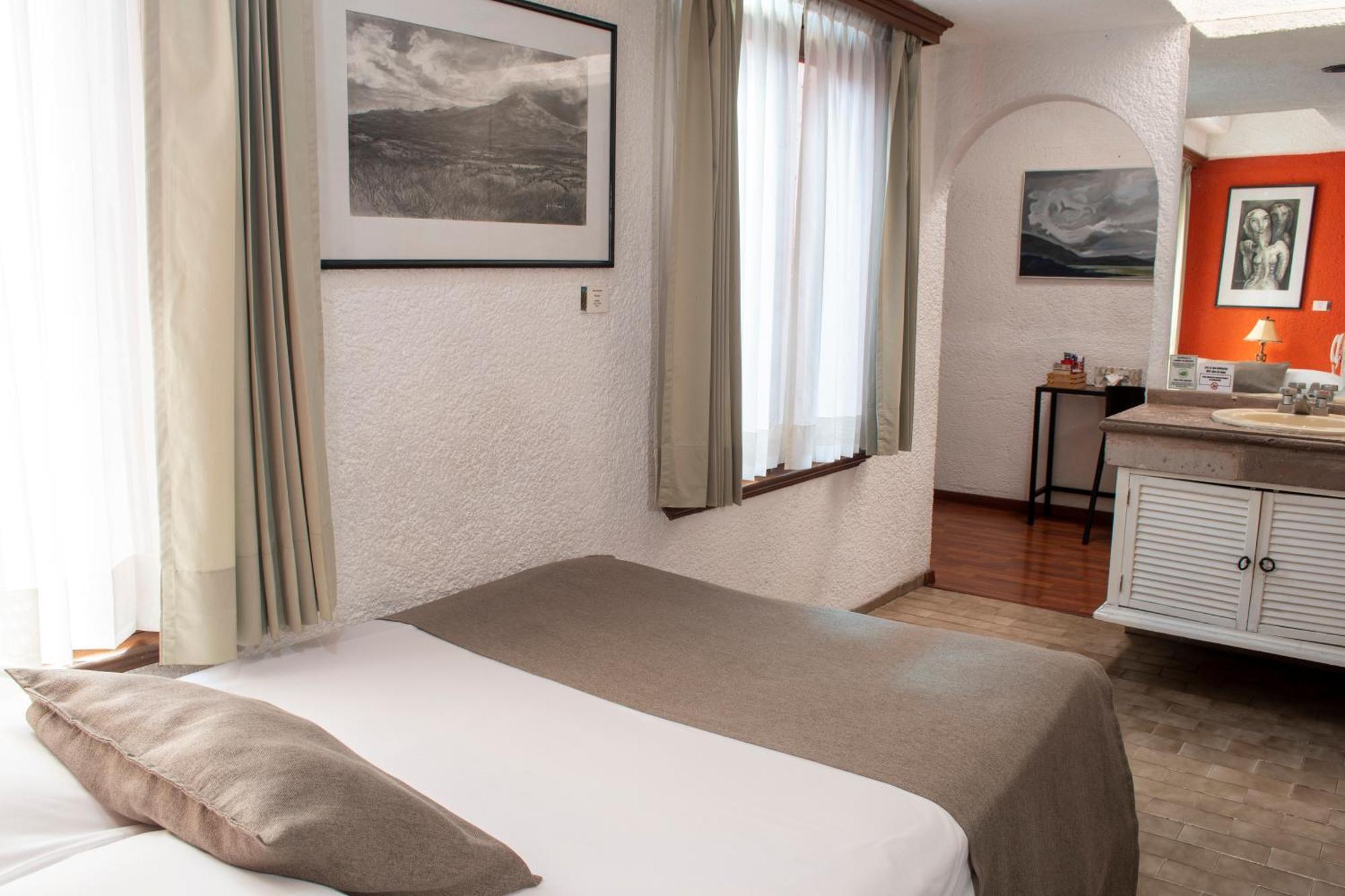 Portico Hotel & Galeria موروليا الغرفة الصورة